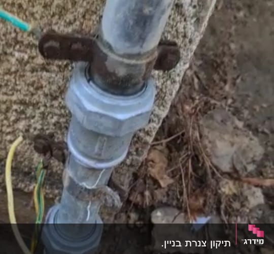 תיקון צנרת בניין.